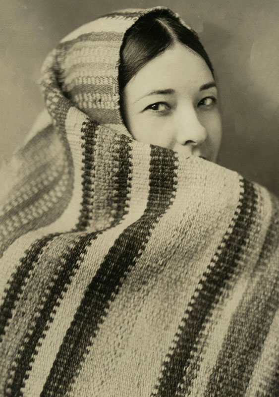 Te Ata wrapped in a blanket